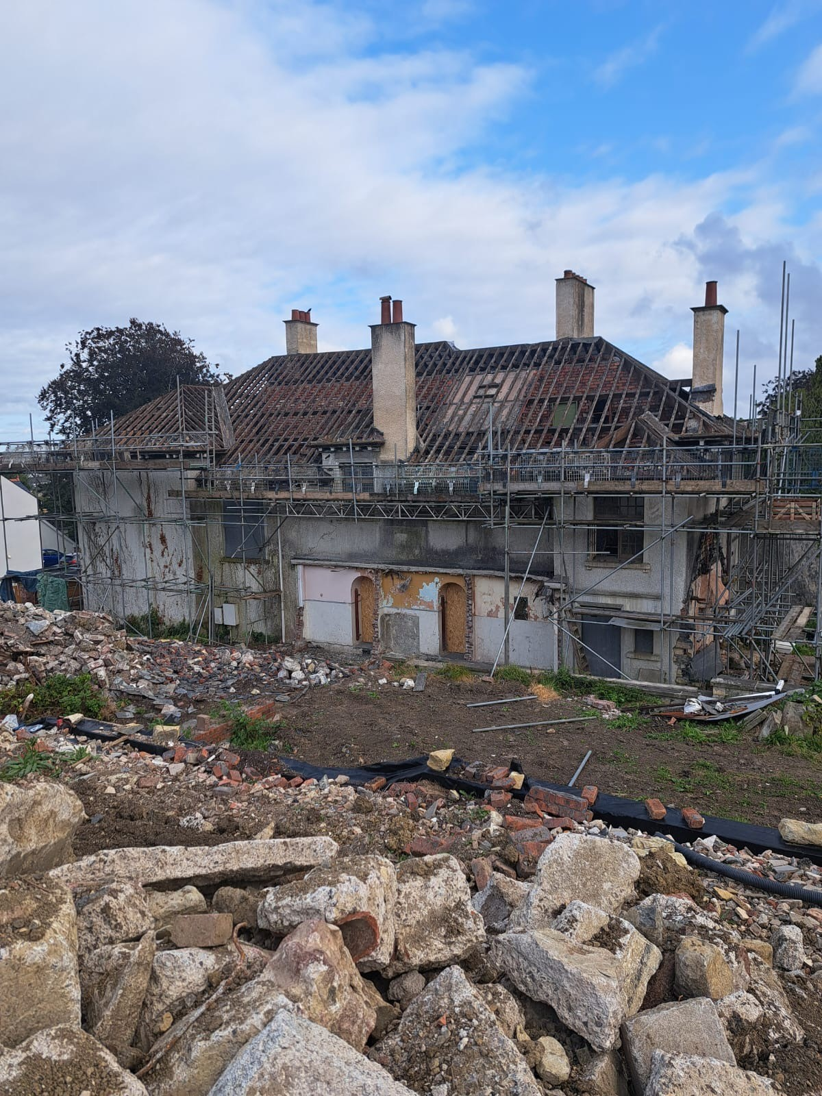 The back of Coed Parc with scaffolding erected during the restoration programme, showing the scale of work underway on the historic building